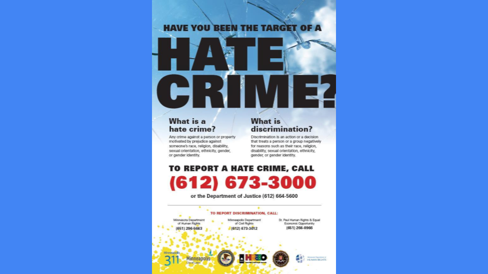 Photo of a MN Flyer that says "Have you been the target of a hate crime?" Call 612-673-3000 or the Department of Justice 