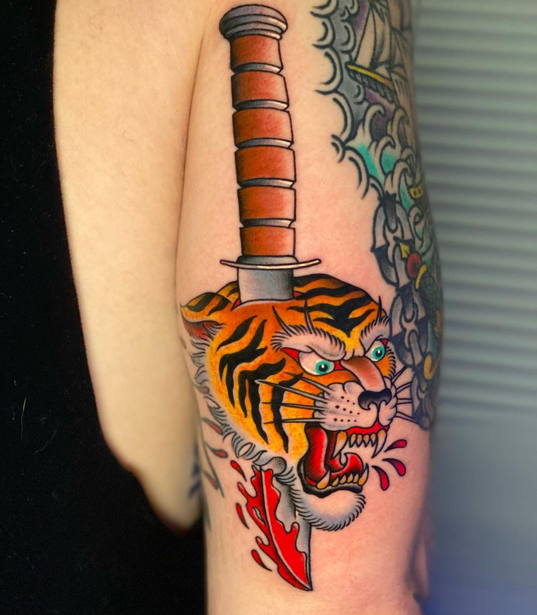Colorful Tiger With Dagger Tattoo