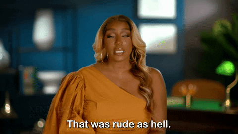 animated gif of nene leakes saying that was rude as hell. there is white text saying the same in a caption.