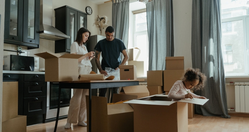 Family packing and researching moving services.