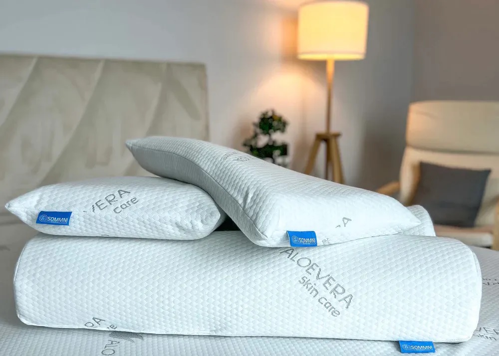 Medium density 100% natural latex pillow with pinhole design, encased in aloe vera skin care fabric