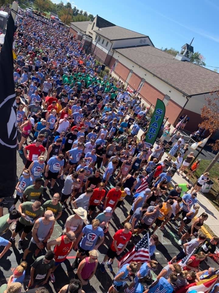 Image may contain: one or more people, crowd and outdoor