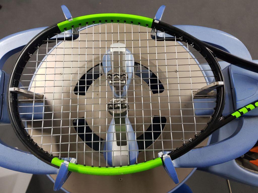 A picture containing tennis, racket, bicycle

Description automatically generated