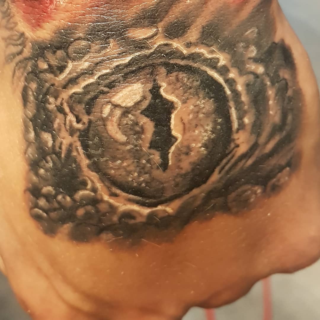 Classic Lizard Eye Tattoo