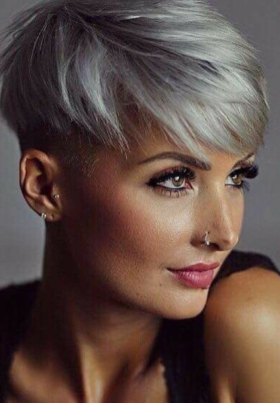 lady with nose ring wearing grey pixie cut