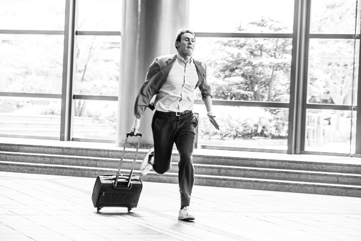 Man running to catch a flight