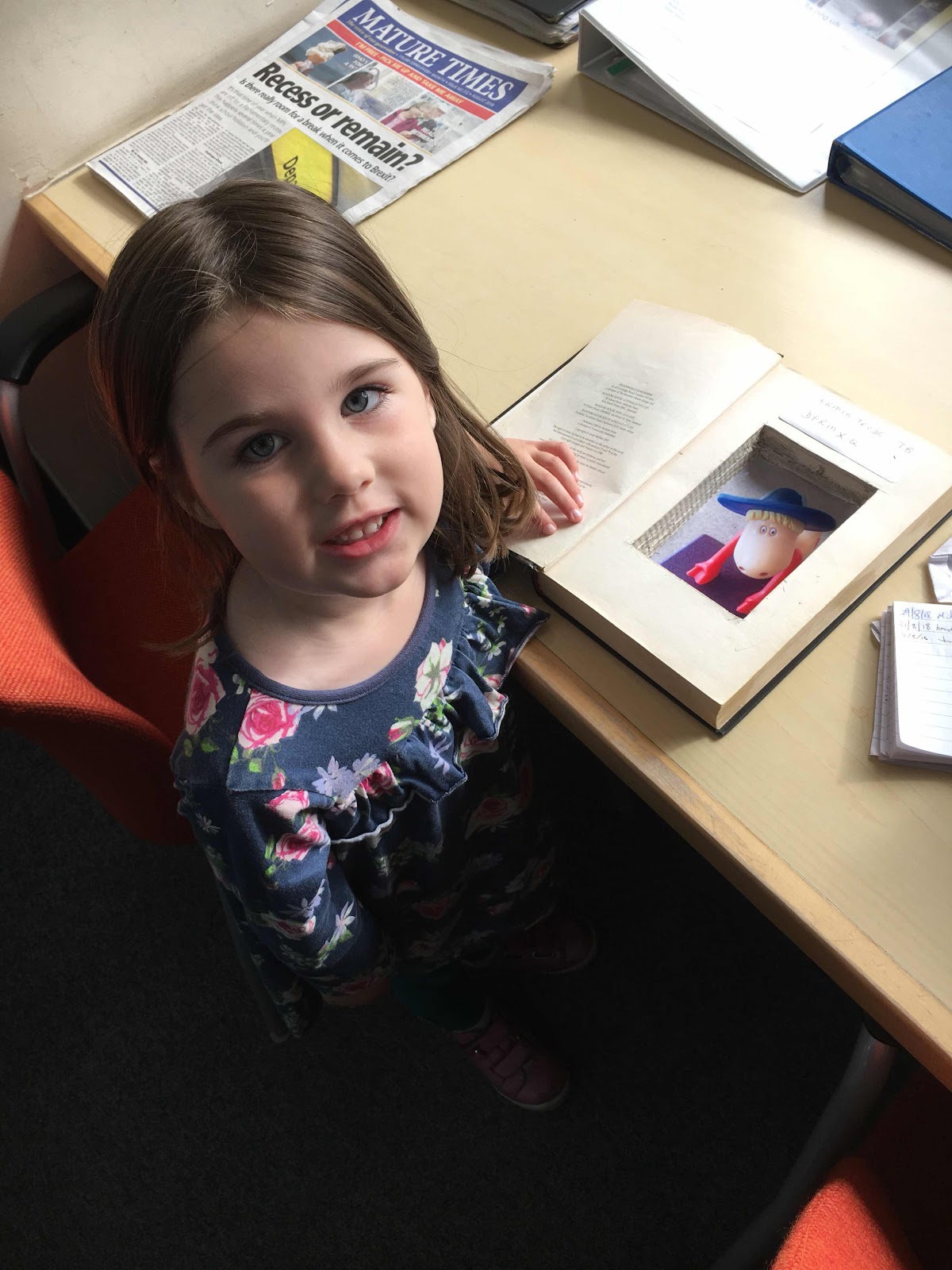 Small geocache inside a library book