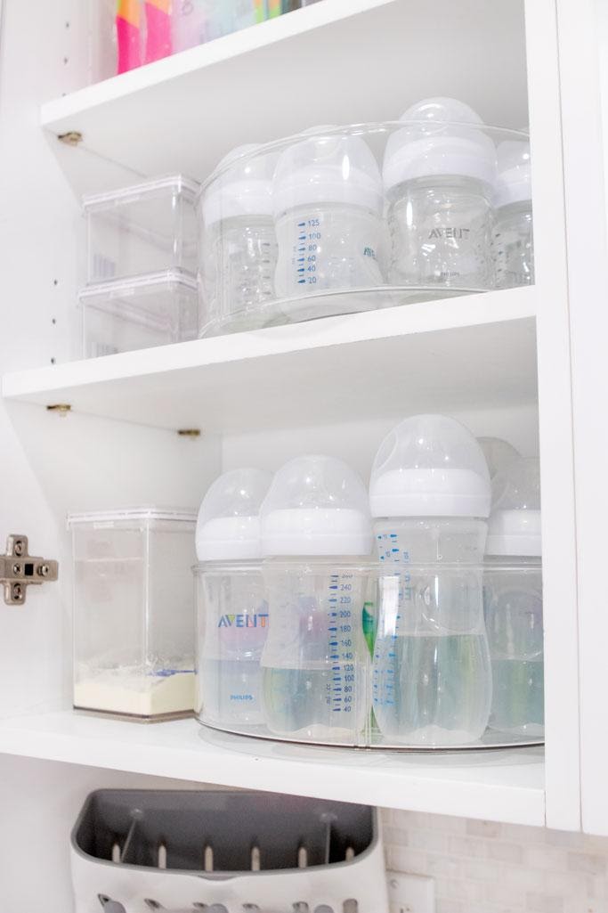 Baby bottles stored in a cabinet