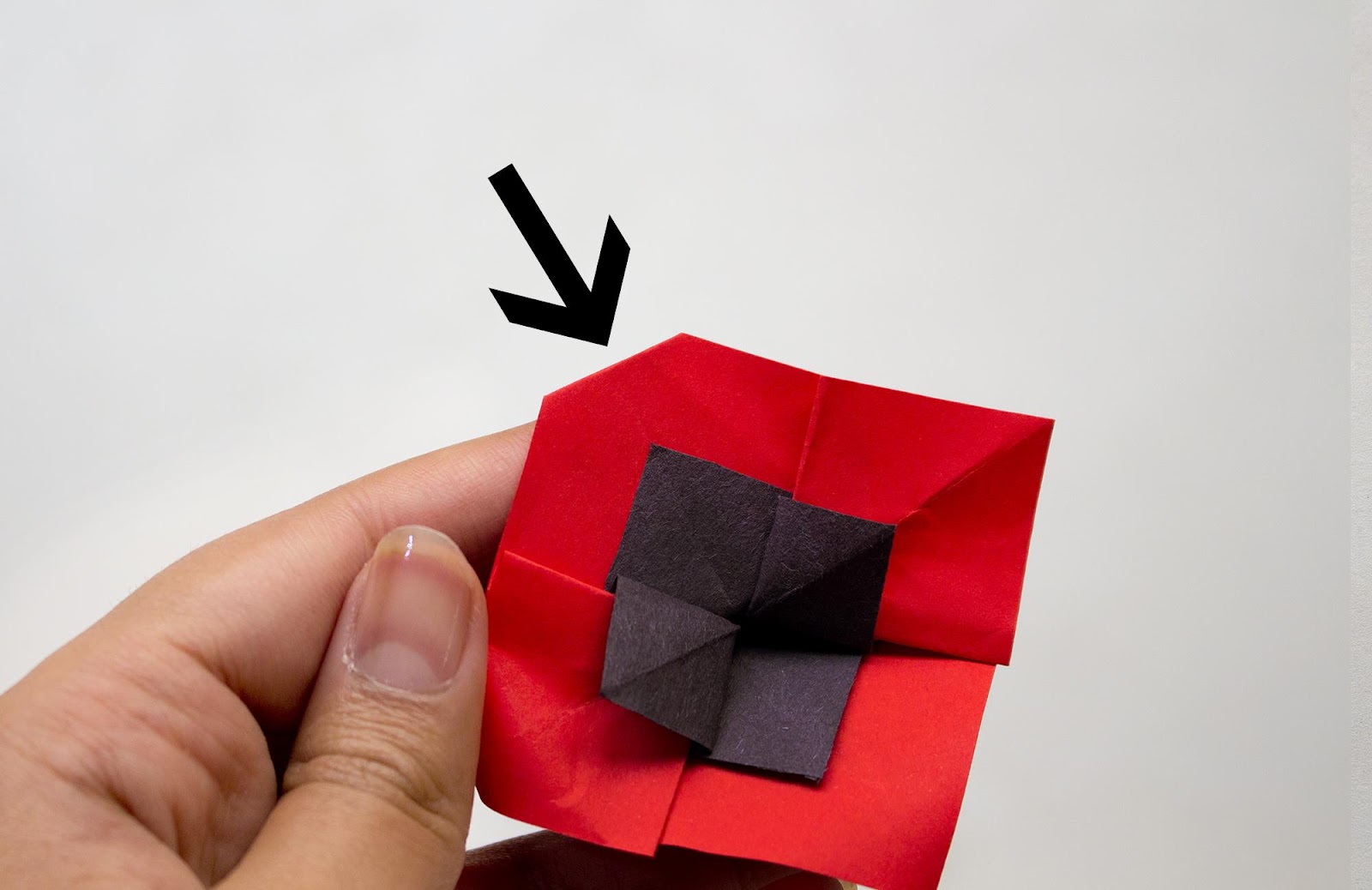 Origami poppy flower step 12