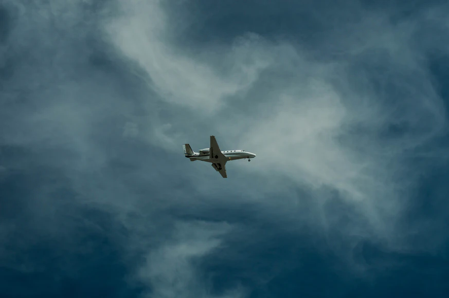 Plane flying in the clouds