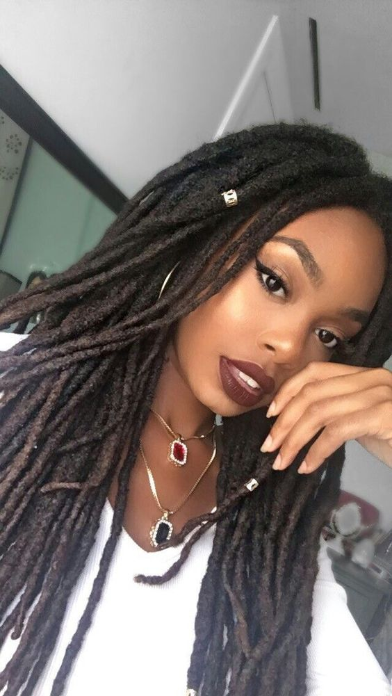 a lady rocking human hair faux locs