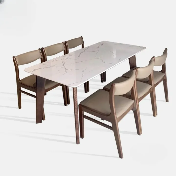 Được cập nhật lên đến năm 2024, chiếc bàn ăn mặt đá chân gỗ này mang đến vẻ đẹp hiện đại và sang trọng cho phòng ăn của bạn. Vươn lên từ truyền thống, chiếc bàn này được kết hợp với chất liệu đá cao cấp và chân gỗ tự nhiên. Hơn thế nữa, phong cách độc đáo và kết cấu chắc chắn của nó sẽ tạo ra một điểm nhấn tuyệt vời trong không gian phòng ăn của bạn.