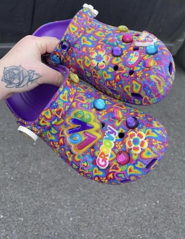 Lady shows off her lisa frank crocs 