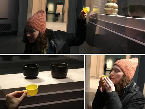 A teacher compares a plastic tea cup to tea bowls in the Freer-Sackler 