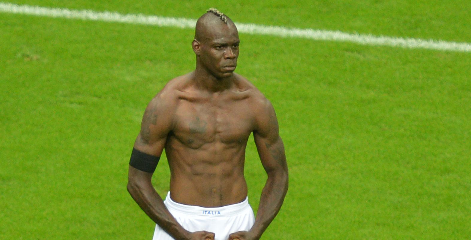 Balotelli’s Famous Pose after Italy’s EuroCup Victory