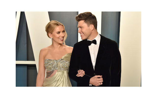 Scarlett Johansson and her husband at the red carpet