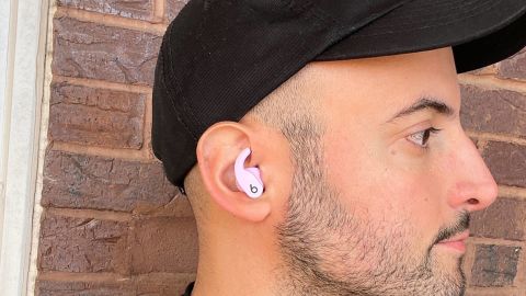 This image shows the man wearing Beats fit pro.