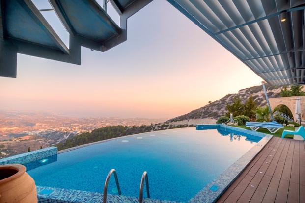 Amazing pool in a luxury home with a view.