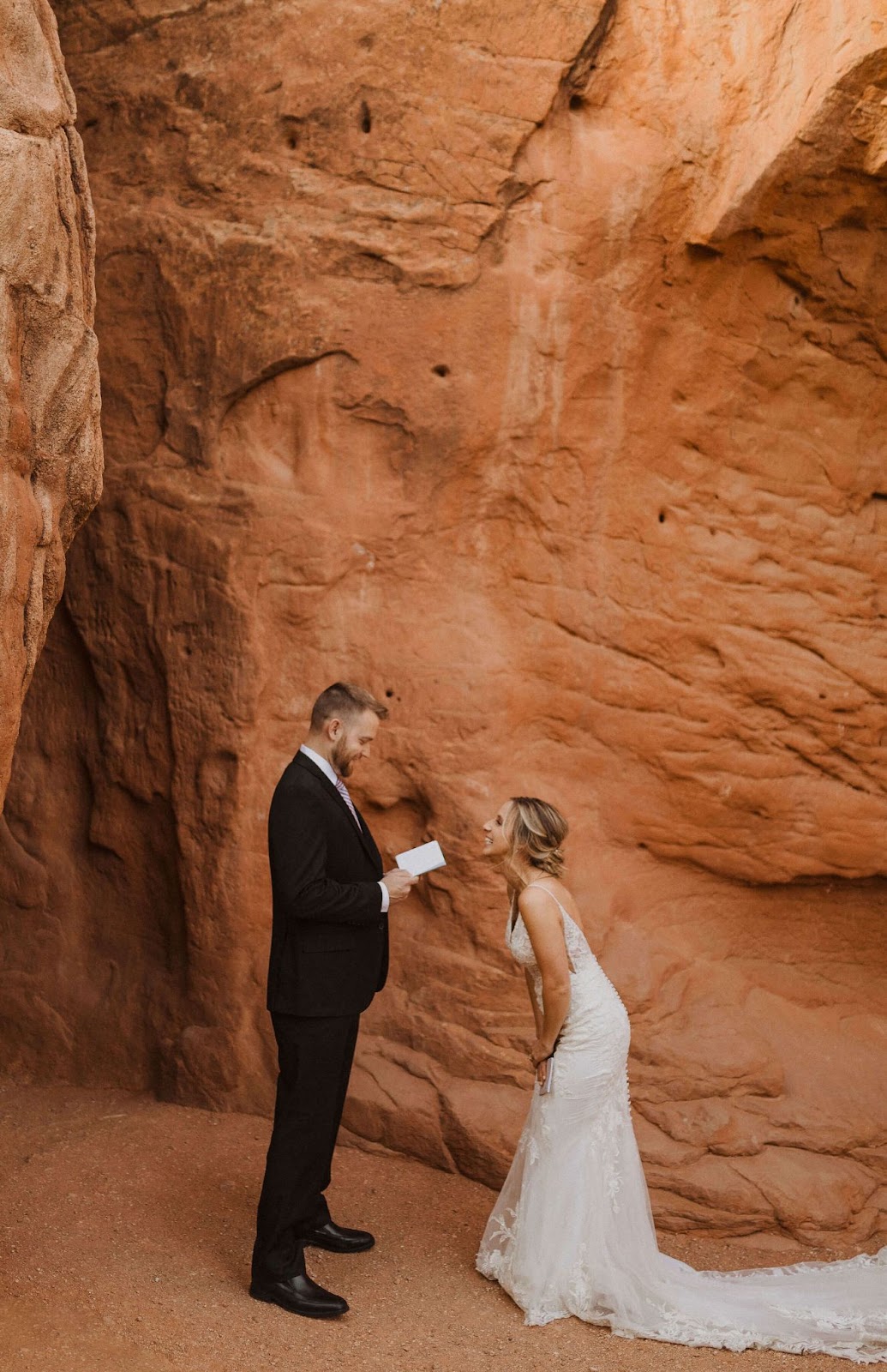 couple reading vows (elopement checklist)