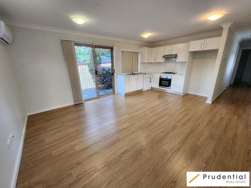 A room with a wood floor

Description automatically generated