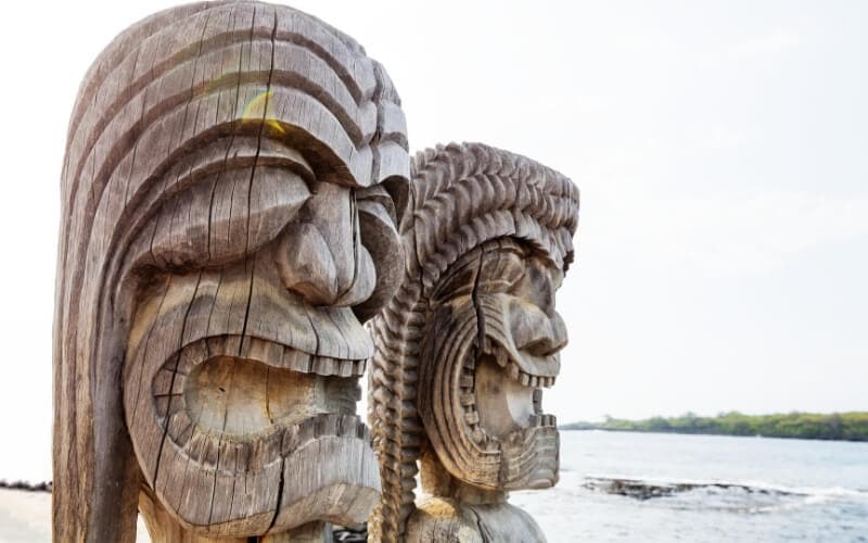 Traditional Hawaiian totems on the beach.