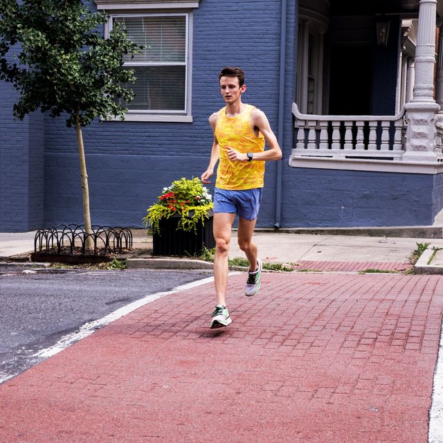 strong runner running across the street