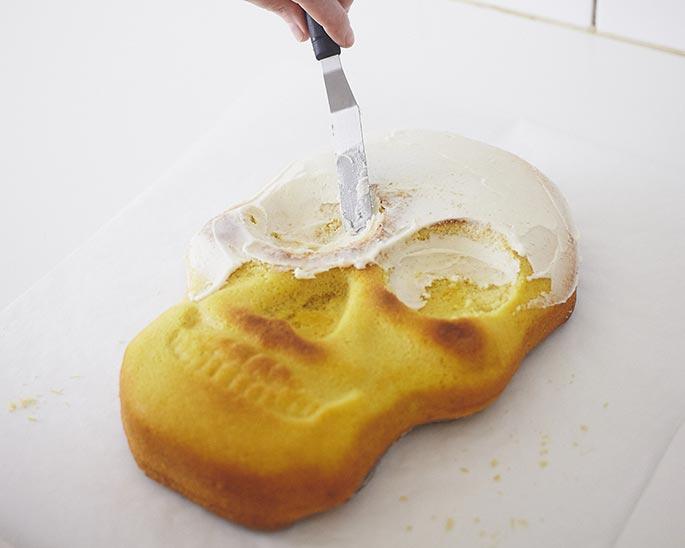 A person cutting a potato with a knife

Description automatically generated with low confidence