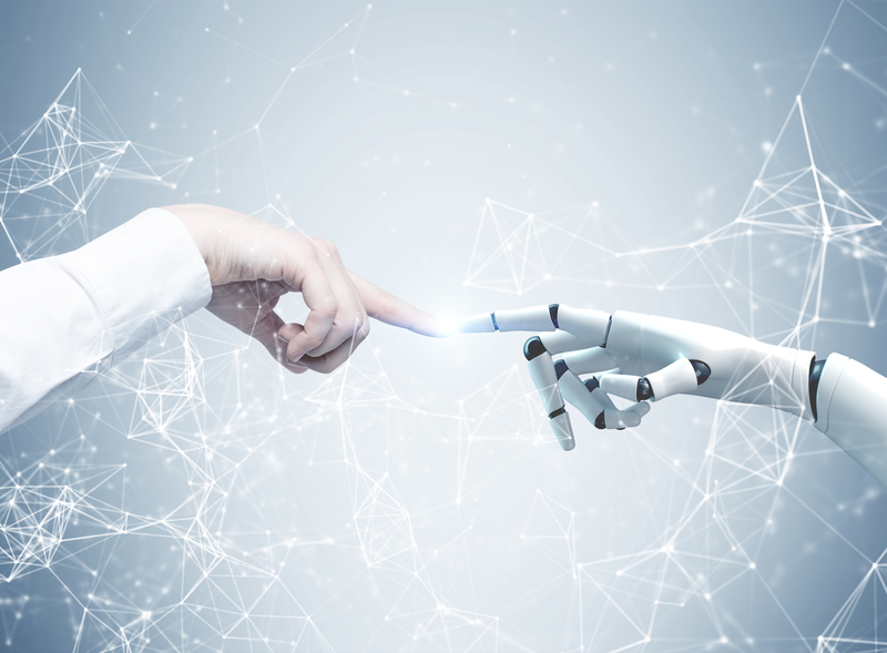 human hand and robot hand together