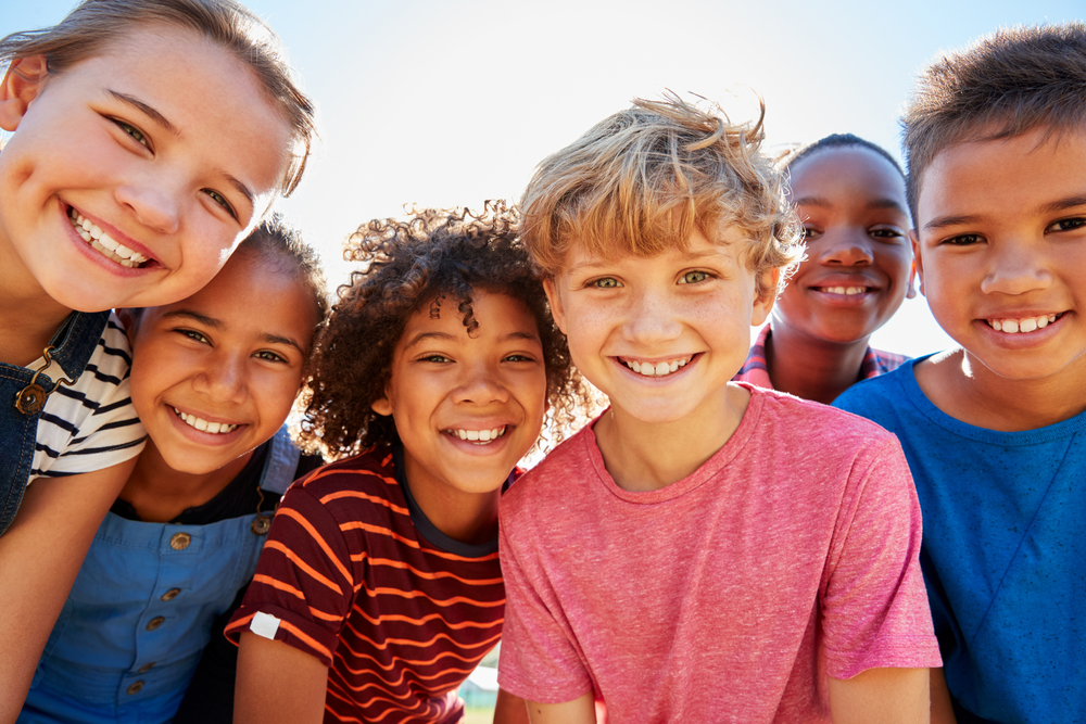 group of diverse kids smiling