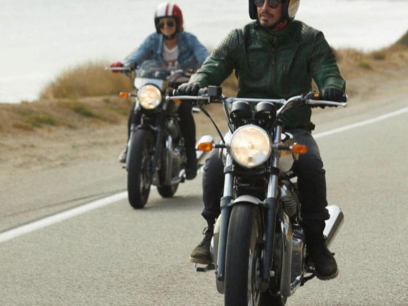 Motorcyclist cruising desert highway - adventure on the open road