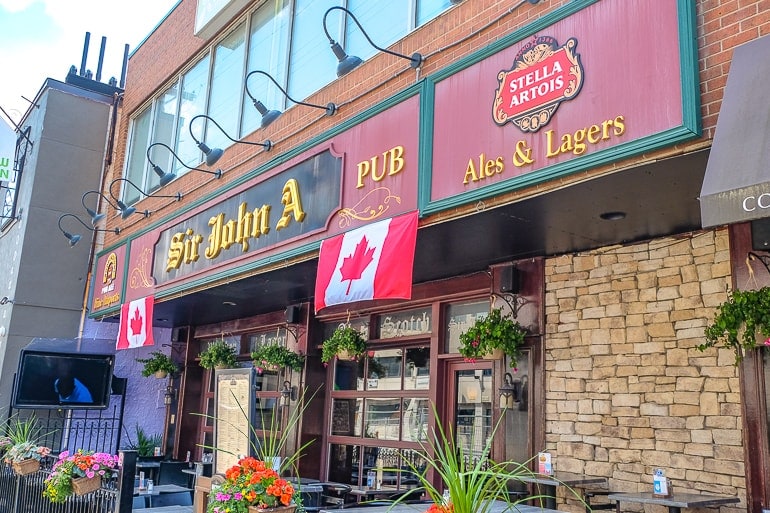 old pub entrance with front patio for sir john a pubs in ottawa