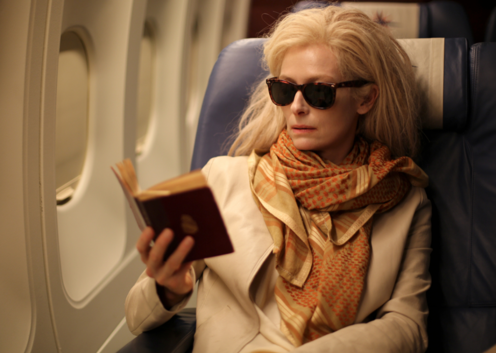Tilda Swinton on an airplane with sunglasses in a scene from ‘Only Lovers Left Alive’