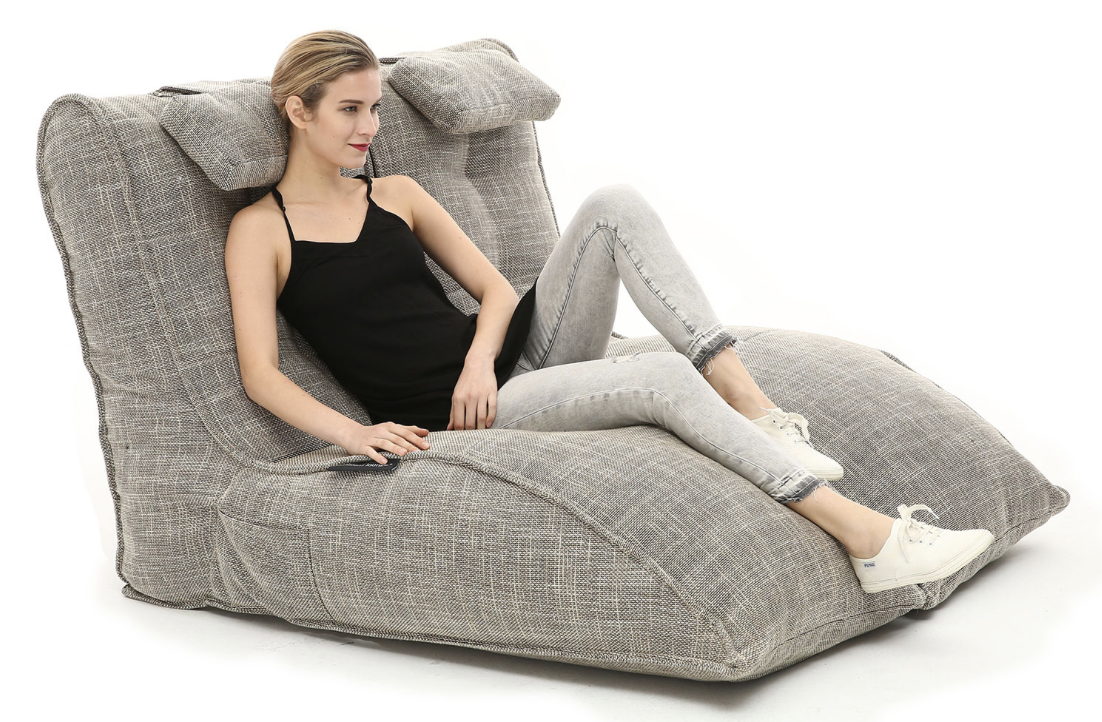 Woman on a grey twin bean bag