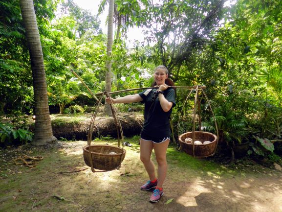 Tera Wilson smiling while interning at EarthRights International in Thailand