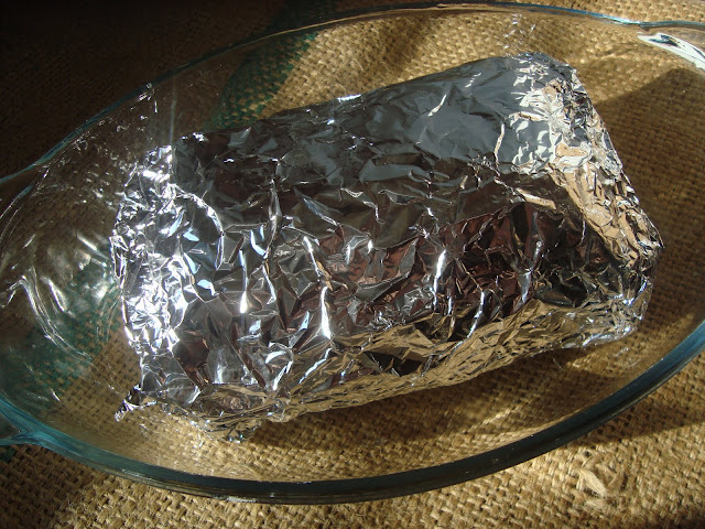 Friptura de vita impanata pe pat de legume
