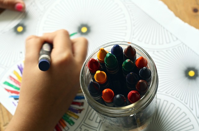 a teenager coloring in the car - things to do on a car trip with a teenager