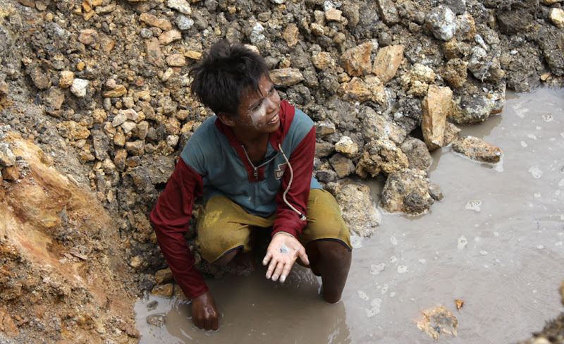 young boy at tine mine