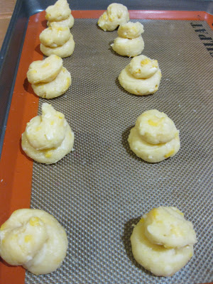 photo of the unbaked Gougères on a plate