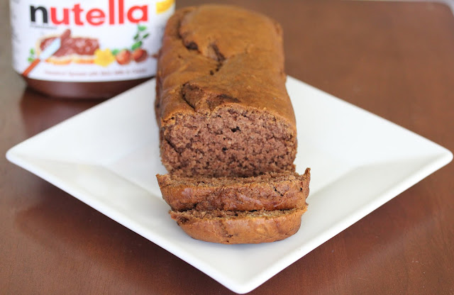 photo of a loaf of Banana nutella bread on a white plate