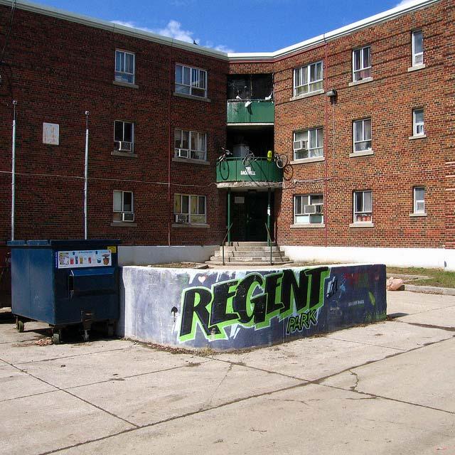 A picture containing text, building, outdoor, sky
Description automatically generated