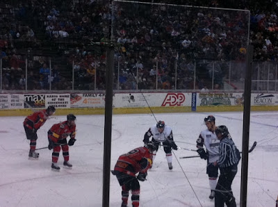 Hockey game glass ice players sticks photo Hockey game glass ice players sticks photo