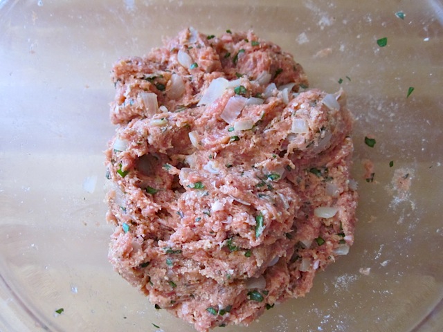 mixed meatball ingredients in bowl 