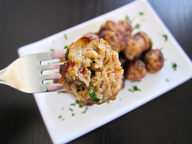 close up of turkey meatball bite on fork 