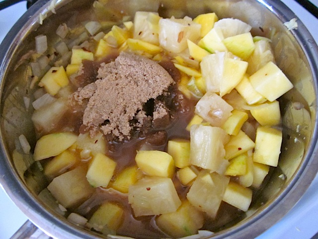 brown sugar and vinegar added to pot of ingredients 