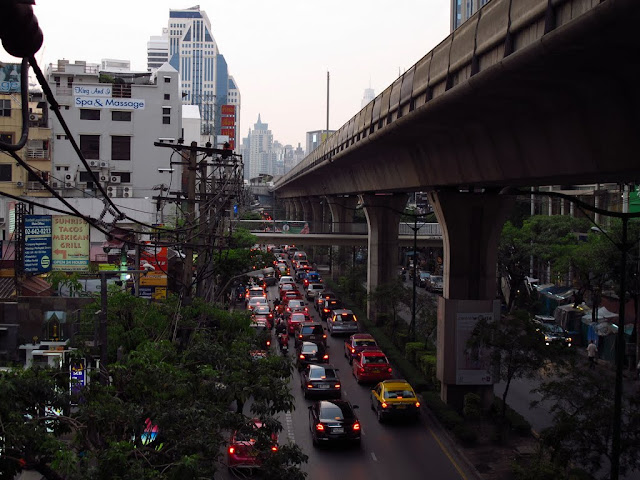 The concrete jungle in Bangkok renders everything dark below the massive terraces