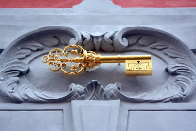 Golden key on a wall in Prague Czech Republic