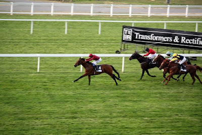 Horse race at Ascot Racecourse in Berkshire England