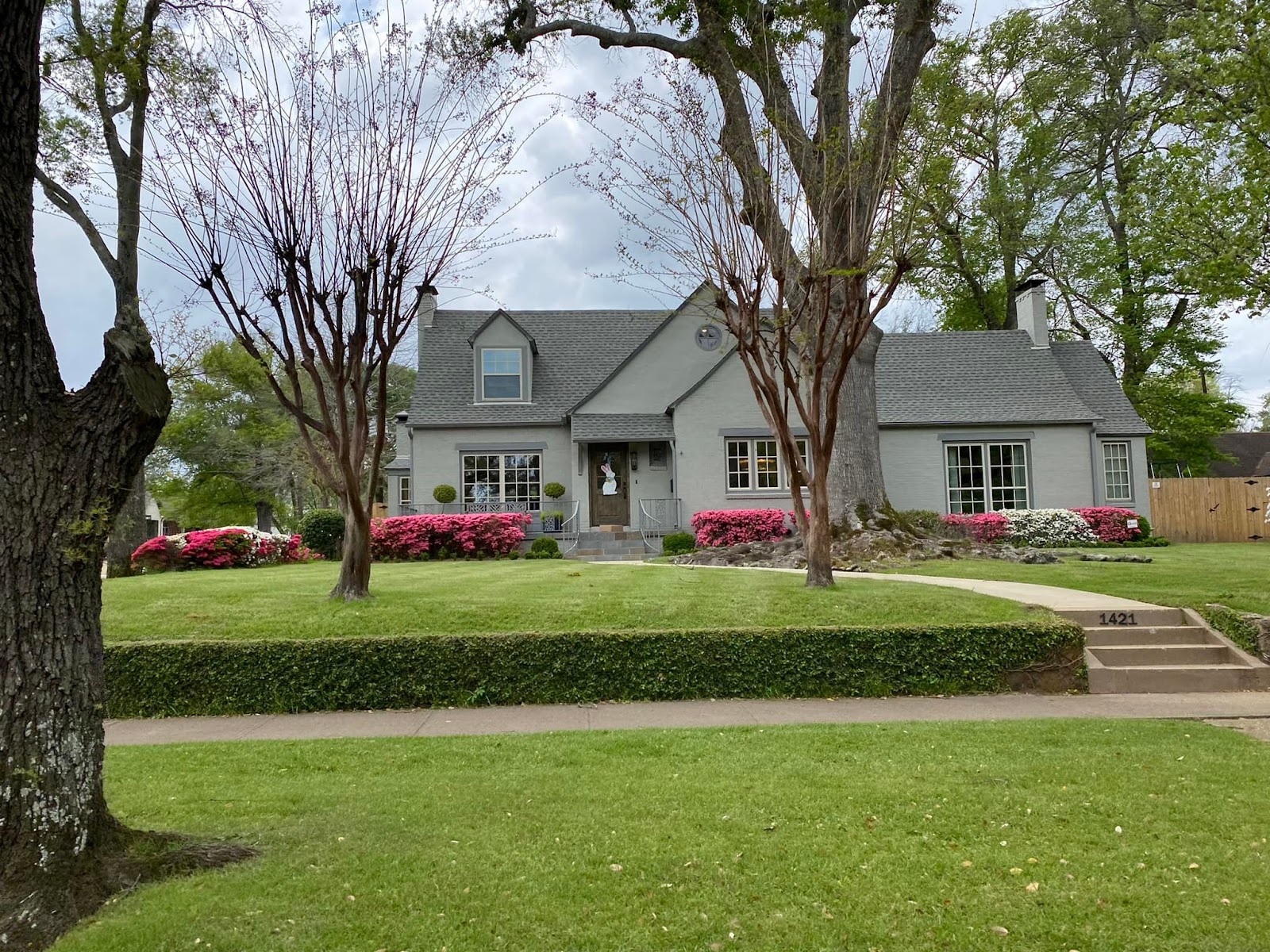 Picture of house with pink azaleas, located in the Azalea District of Tyler, TX