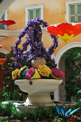 Bellagio Umbrellas 6 This is a photo of the garden scene behind the concierge desk at the Bellagio Hotel and Casino in Las Vegas, NV.
