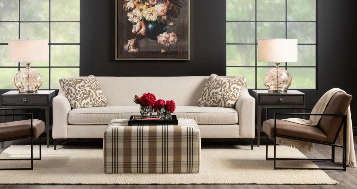 White Sofa, Plaid Ottoman, and Mixed Material Accent Chairs in Living Room 